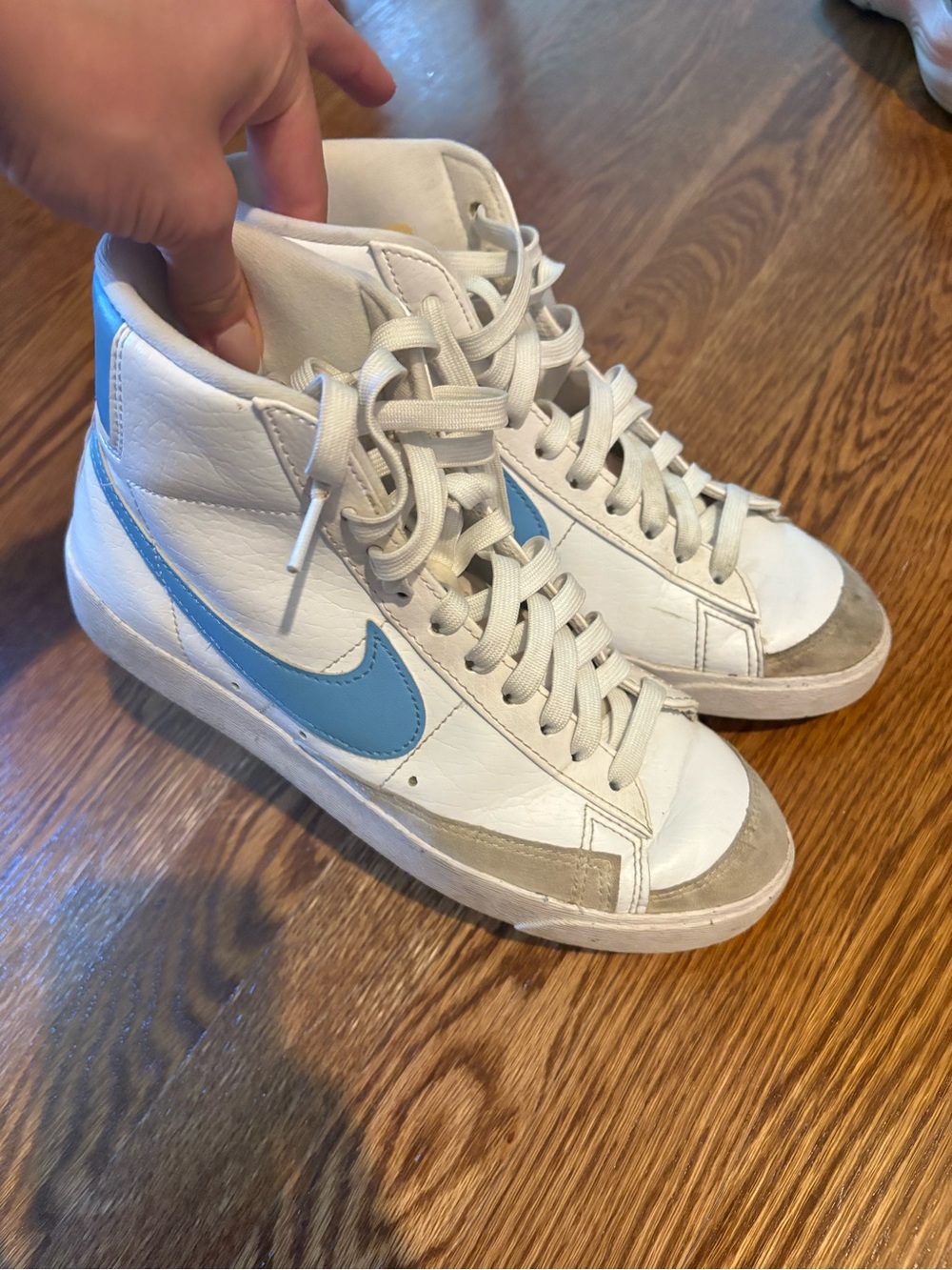 Nike women’s White High-Top Blazerz with Light Blue Swoosh